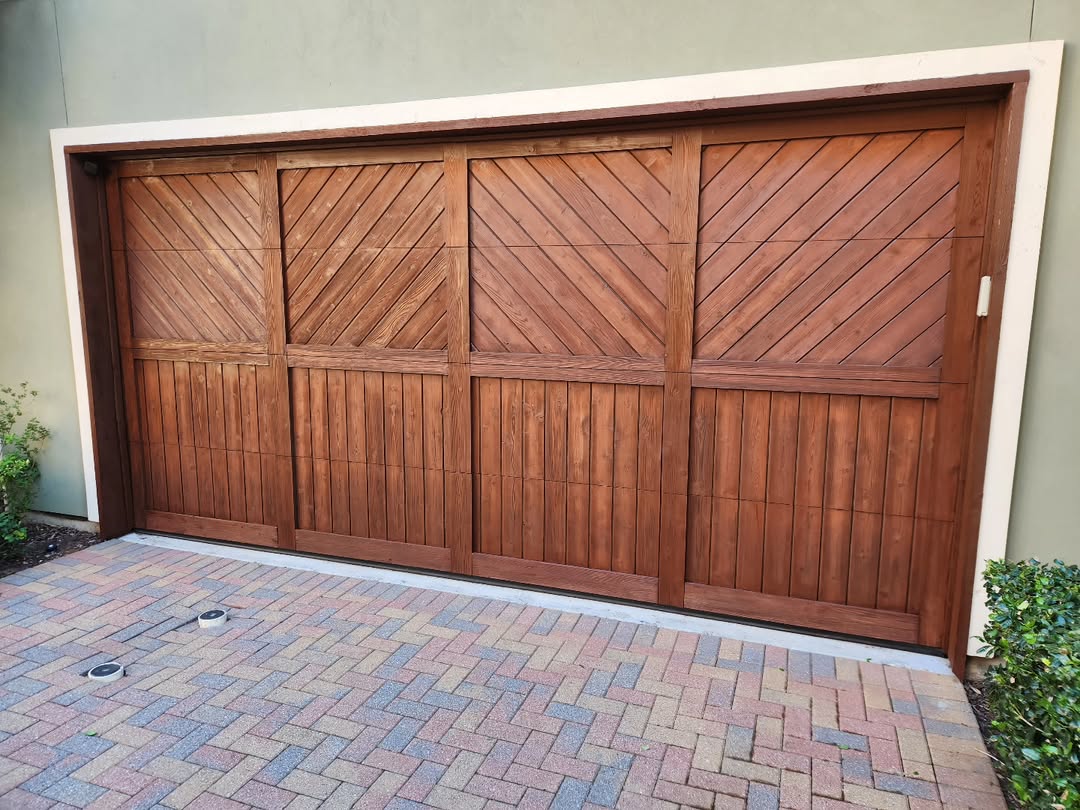 Walnut chevron pattern custom wood garage door